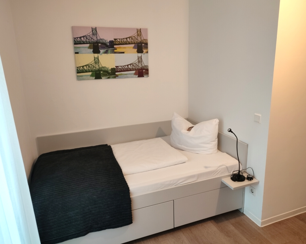Bett imPenthouse Studio, Serviced Apartments SPREEPOLIS Berlin nahe Flughafen Schönefeld